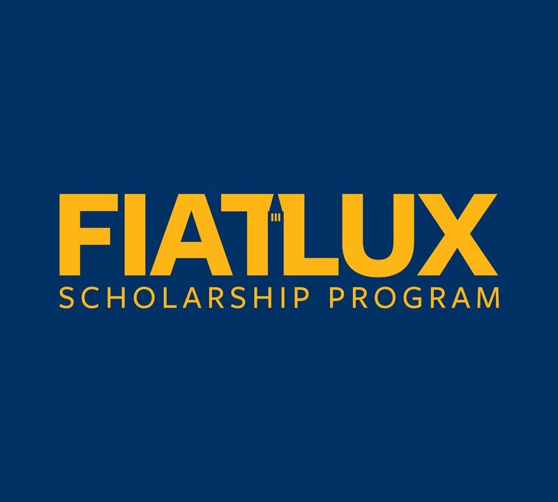 Fiat Lux Scholarshop Program yellow on blue background color